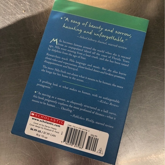 The Music of Dolphins by: Karen Hesse, paperback book - Picture 5 of 6